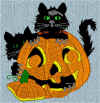 cats-in-pumpkin.jpg (58792 bytes)